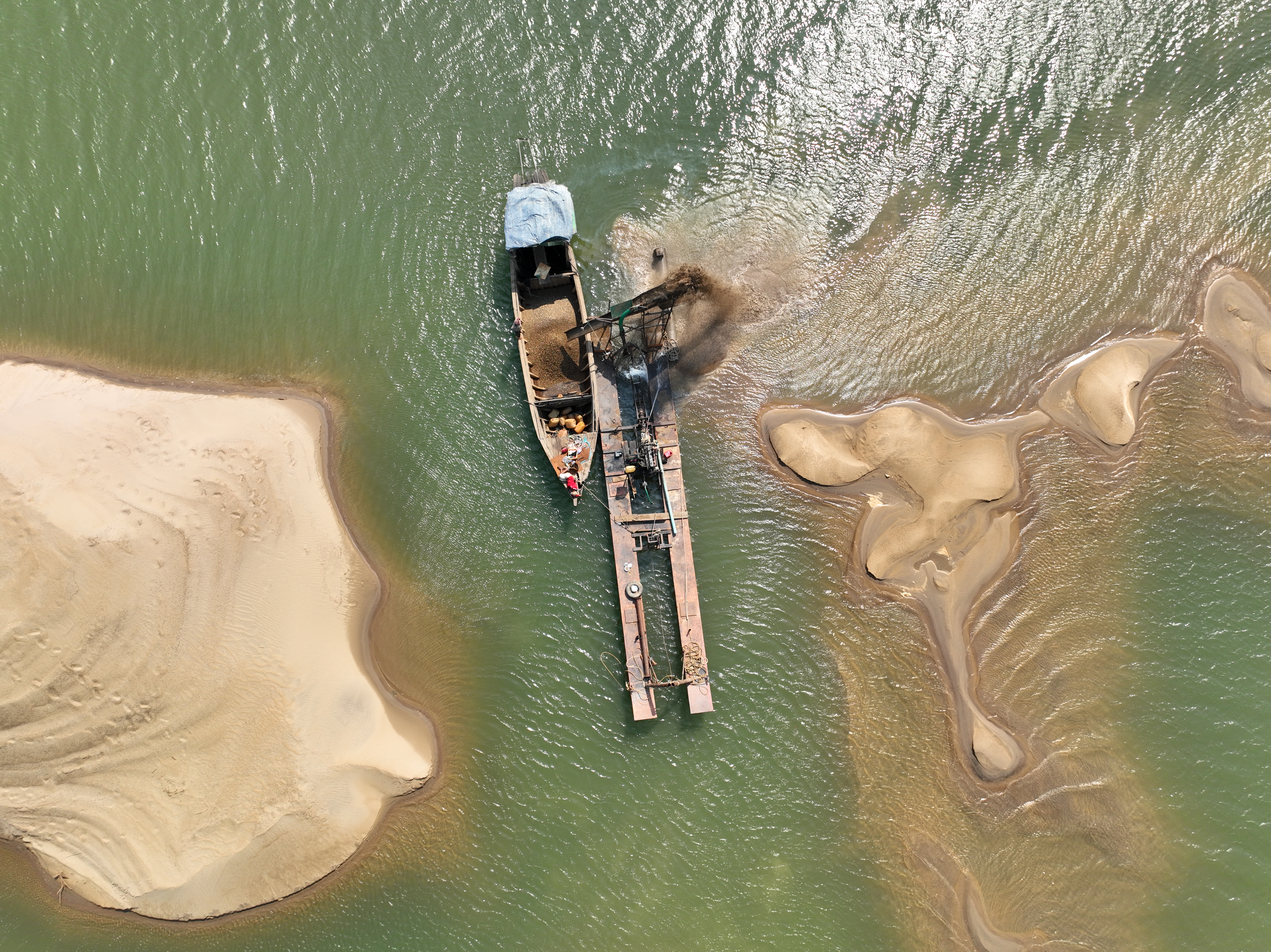 Sand mining dredger on the Mekong River near Kratie, Cambodia